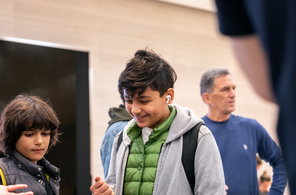 apple airpod pro launch ny portrait kid 10302019 big.jpg.large 2x