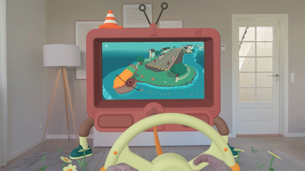 A living room scene featuring a gaming setup with a red TV-like device, showcasing a colorful racing game on its screen, and a steering wheel in front. The environment includes a lamp and a door in the background.