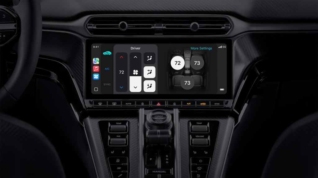 A vehicle interior showcasing a touchscreen display with climate control and settings options, emphasizing advanced car technology.