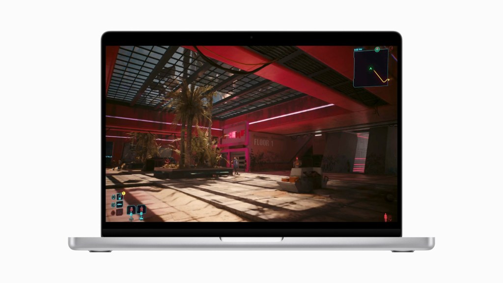 A laptop displaying a colorful gaming scene set in a futuristic environment, featuring palm trees and neon lights.