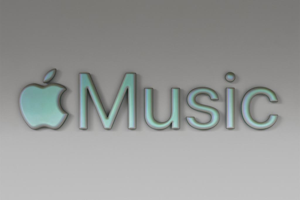 Apple 로고와 함께 'Music'이라는 텍스트가 있는 이미지로, Apple Music을 상징하는 디자인입니다.