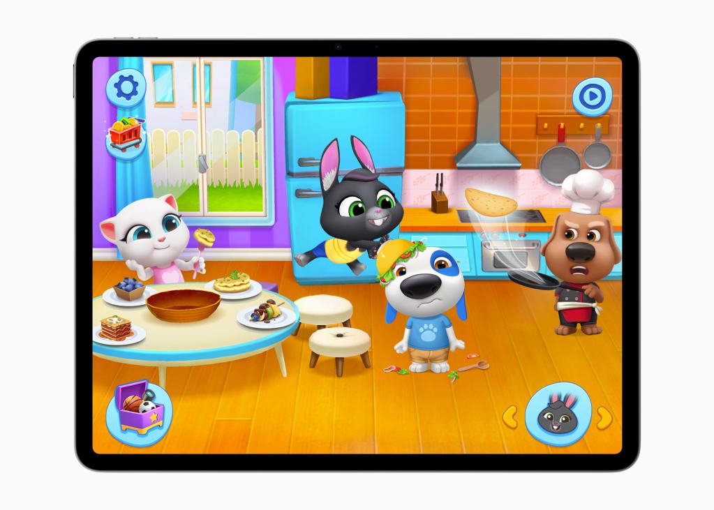 A colorful scene from the game My Talking Tom Friends+, featuring cartoon animal characters interacting in a kitchen setting.