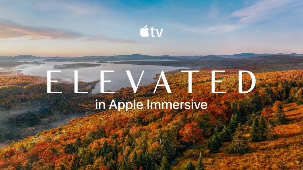 A scenic view of a colorful autumn landscape featuring hills and a lake, with the text 'ELEVATED in Apple Immersive' prominently displayed.