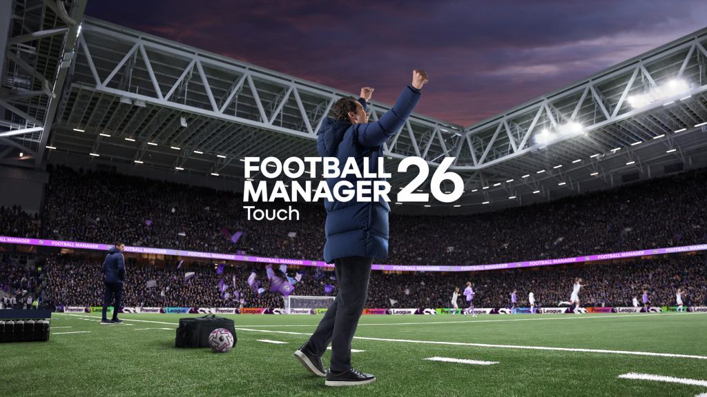 Football Manager 26 Touch의 배경에서 축구 경기 중 관중을 향해 두 손을 들어 흔드는 감독의 모습.